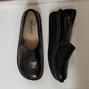 Alegria black clogs embossed leather